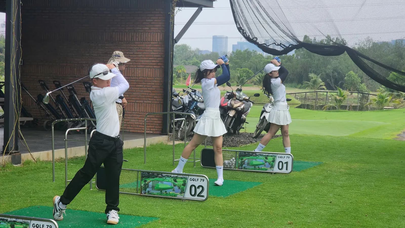 A coaching session on the range